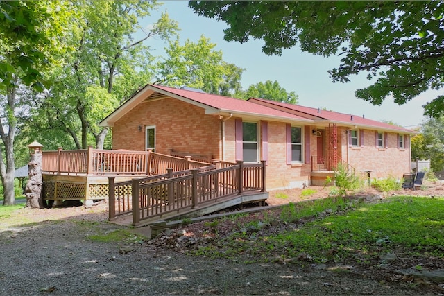 view of front facade with a deck