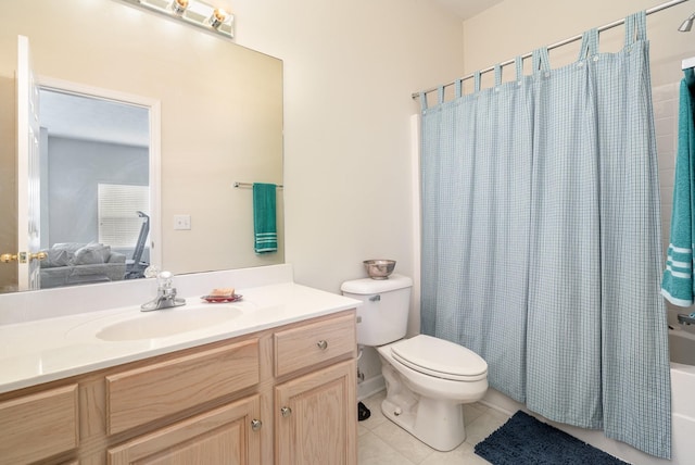 full bathroom with tile patterned flooring, vanity, shower / tub combo, and toilet