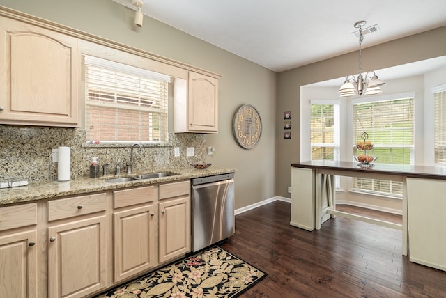 kitchen with tasteful backsplash, sink, light brown cabinets, dishwasher, and dark wood-type flooring