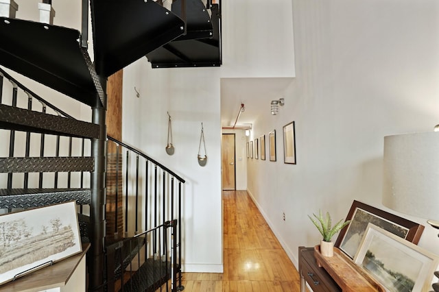 stairway featuring hardwood / wood-style flooring