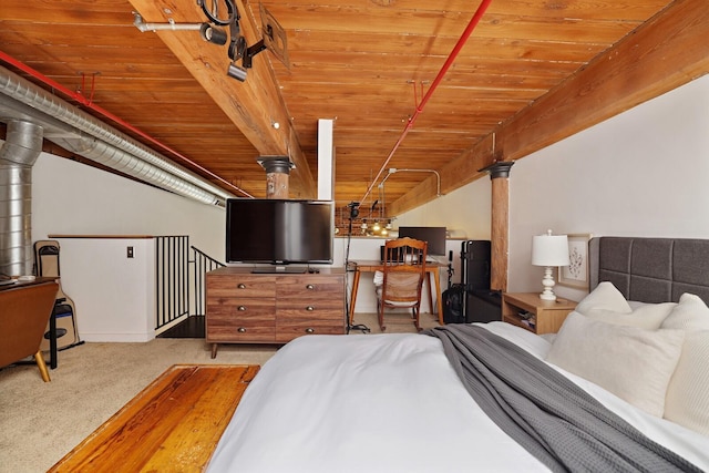 bedroom with wood ceiling, ornate columns, and carpet