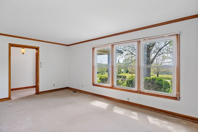 empty room with concrete flooring, crown molding, visible vents, and baseboards