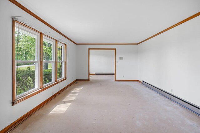 empty room featuring ornamental molding, a wealth of natural light, and a baseboard heating unit