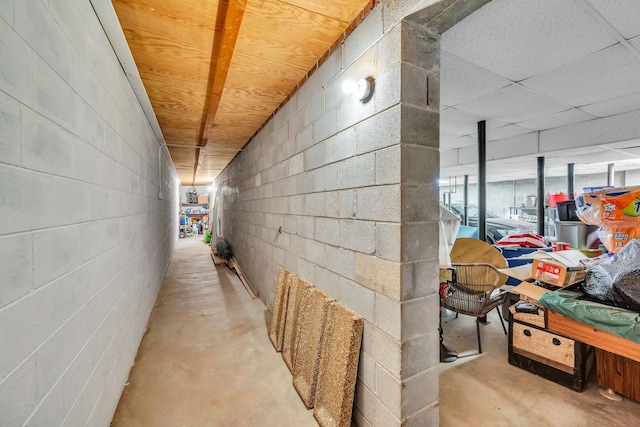 corridor featuring a paneled ceiling