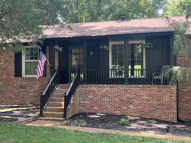 view of front facade featuring covered porch