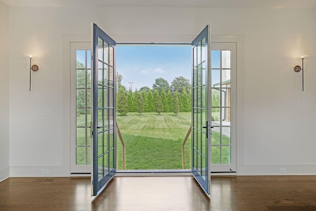 doorway featuring dark hardwood / wood-style floors