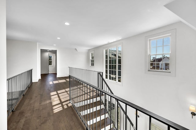 hall with dark hardwood / wood-style floors