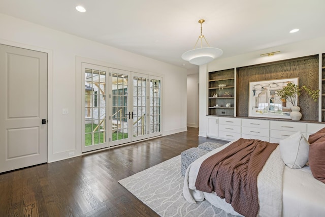 bedroom featuring dark wood-type flooring and french doors