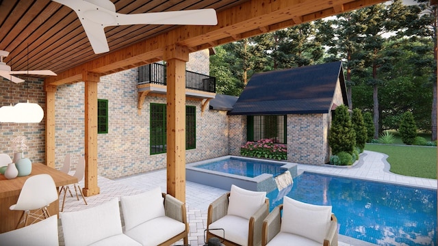 view of swimming pool with an in ground hot tub and ceiling fan