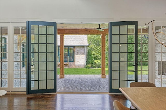 doorway to outside with dark hardwood / wood-style flooring and french doors