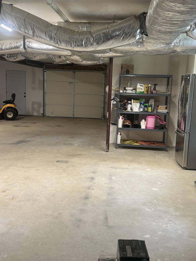 garage featuring freestanding refrigerator