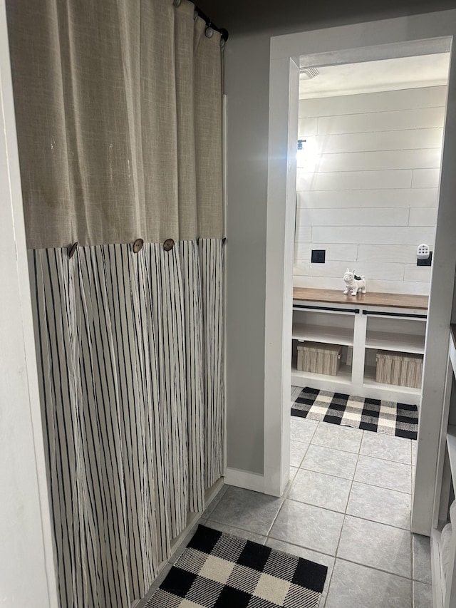 bathroom featuring tile patterned flooring