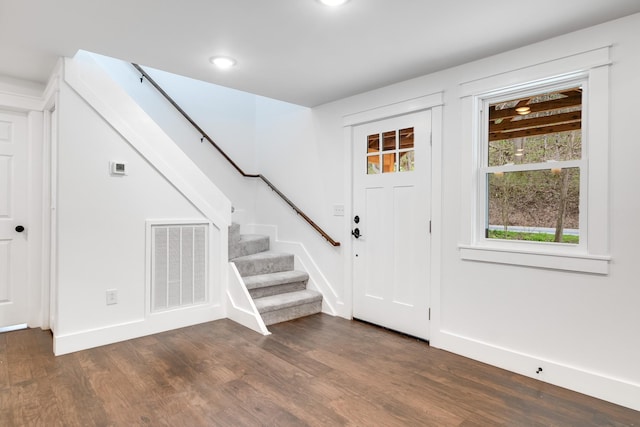 entryway featuring dark wood-type flooring