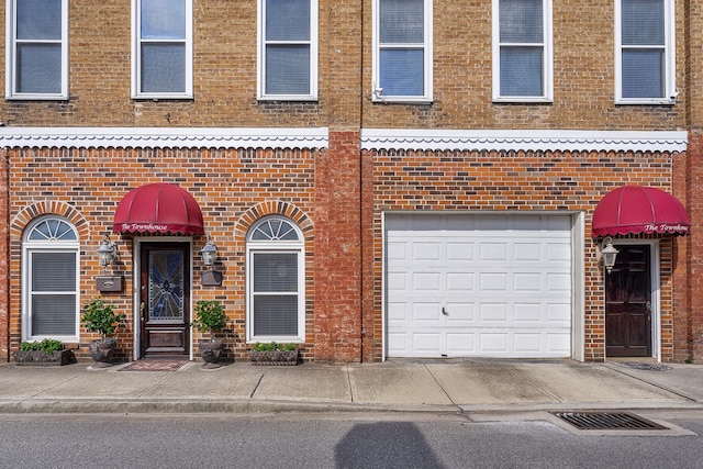 view of front of property featuring a garage