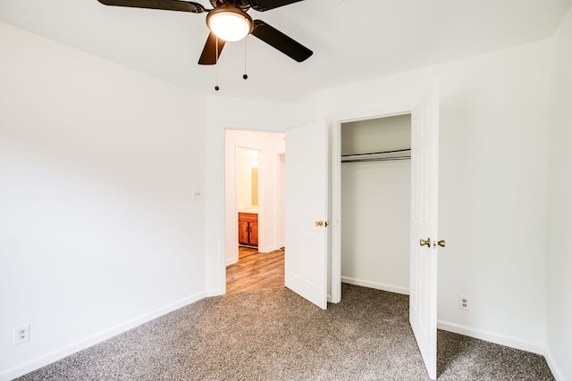 unfurnished bedroom featuring carpet flooring and ceiling fan