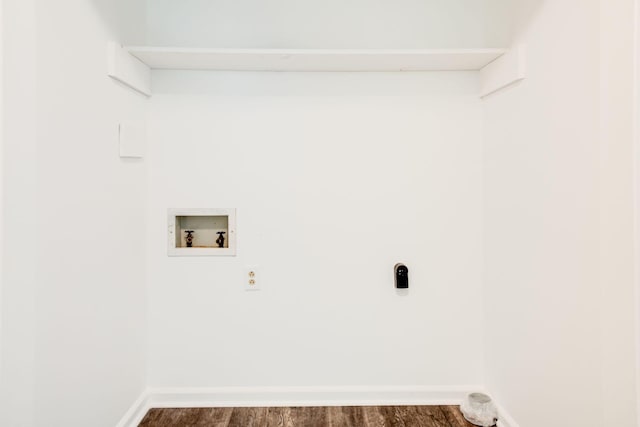 laundry room with washer hookup, hookup for an electric dryer, baseboards, and wood finished floors