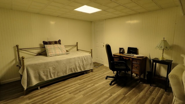 bedroom featuring wood finished floors