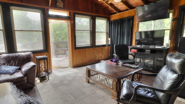 sunroom with vaulted ceiling with beams and wooden ceiling