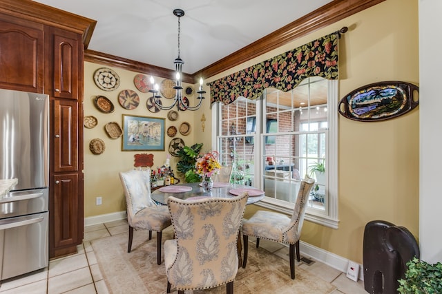 dining room featuring ornamental molding and light tile patterned floors