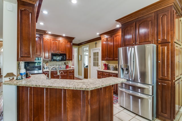 kitchen with light tile patterned floors, tasteful backsplash, stainless steel fridge with ice dispenser, sink, and kitchen peninsula