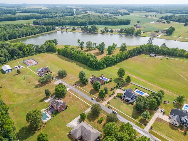 aerial view with a rural view and a water view