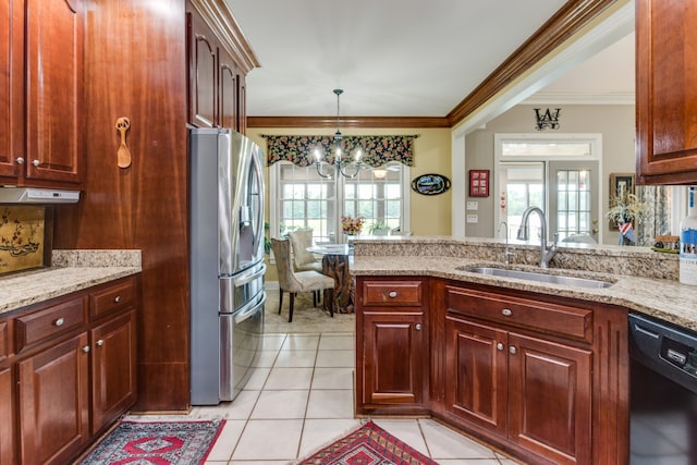 kitchen with plenty of natural light, sink, dishwasher, and stainless steel fridge