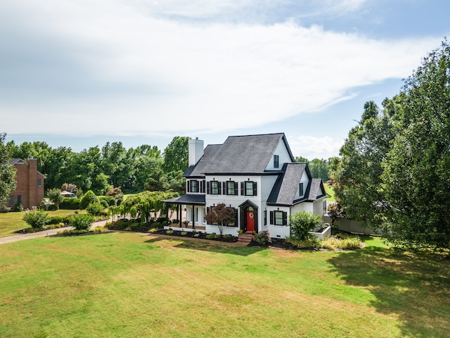 exterior space with a front lawn