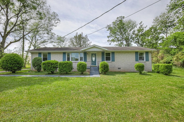 single story home featuring brick siding, crawl space, and a front yard