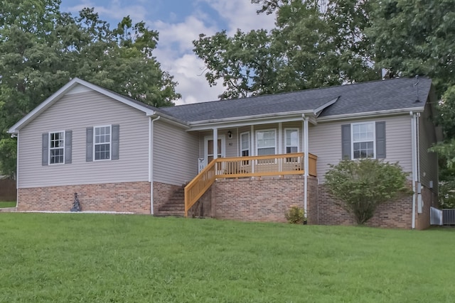 ranch-style house with a front lawn