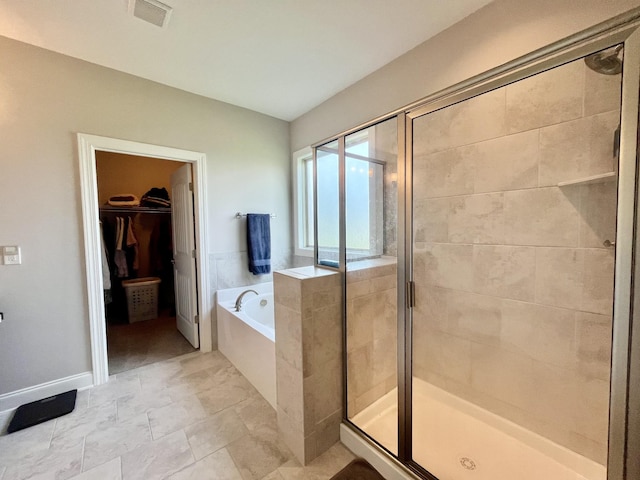 bathroom with independent shower and bath