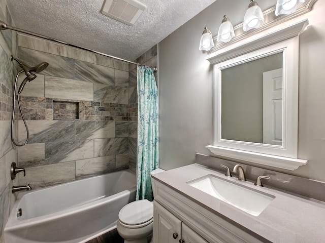 full bathroom with vanity, a textured ceiling, toilet, and shower / bath combo