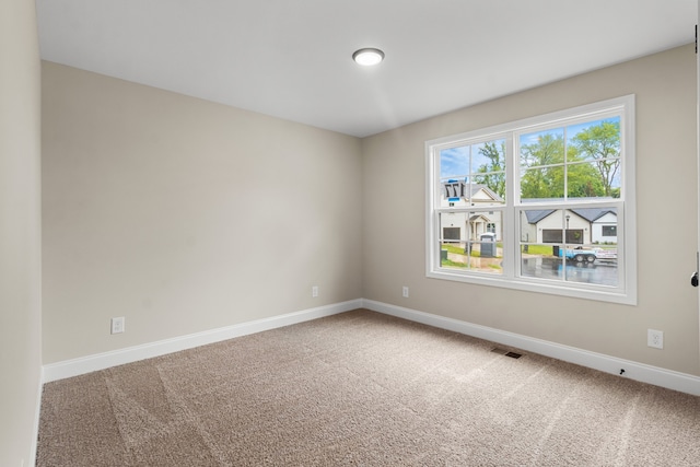 view of carpeted spare room