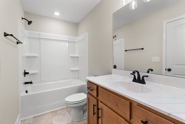 full bathroom featuring tile patterned floors, bathtub / shower combination, toilet, and vanity