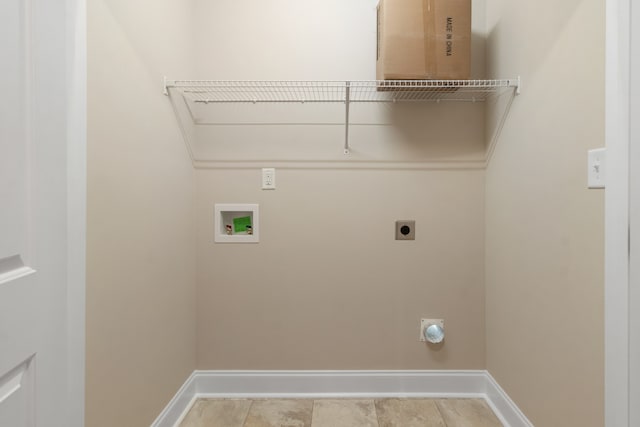 laundry room featuring hookup for a washing machine, light tile patterned flooring, and hookup for an electric dryer