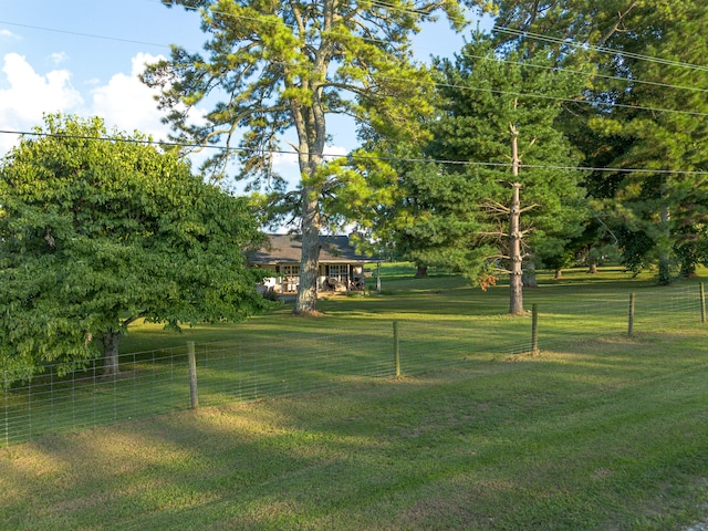 view of home's community featuring a yard