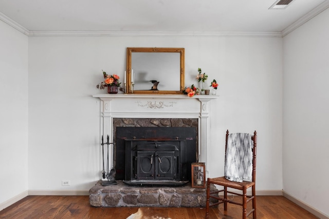 details featuring baseboards, wood finished floors, and crown molding