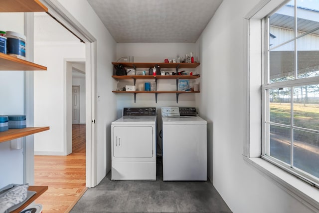 laundry room with laundry area and separate washer and dryer