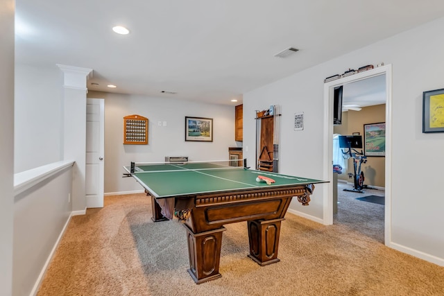 game room with light colored carpet