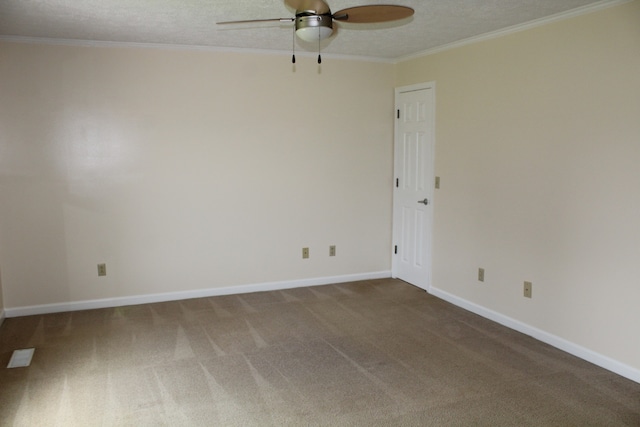 carpeted empty room with a textured ceiling and ceiling fan