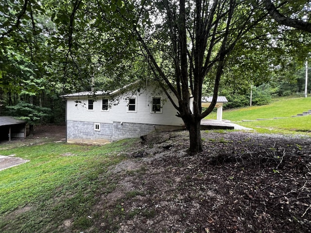 exterior space with a lawn