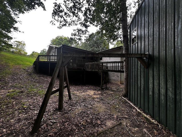 view of yard featuring a wooden deck