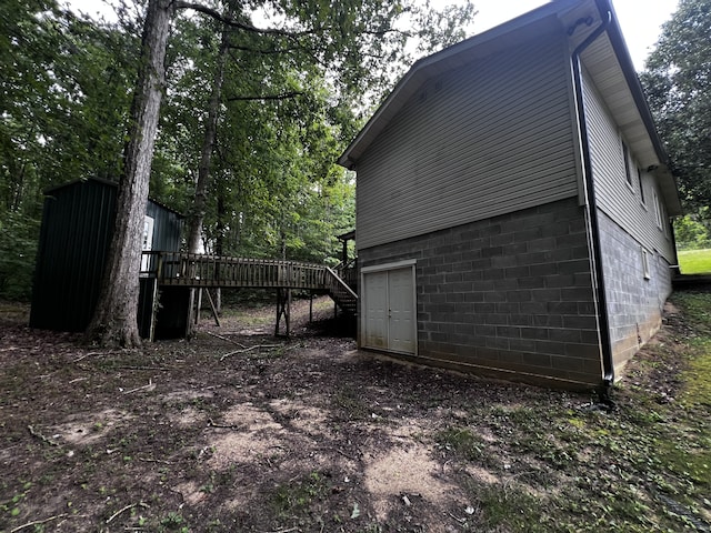 view of home's exterior with a deck