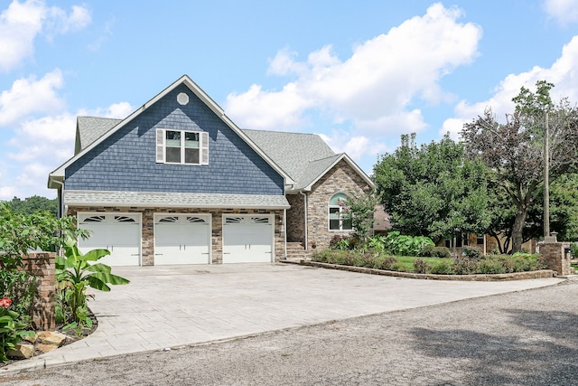 view of front of property with a garage