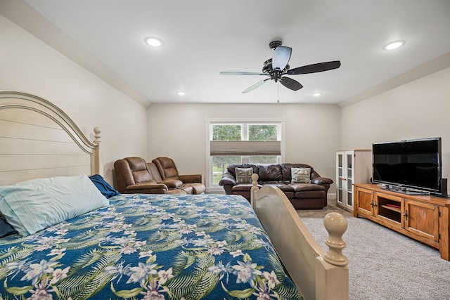 carpeted bedroom featuring ceiling fan