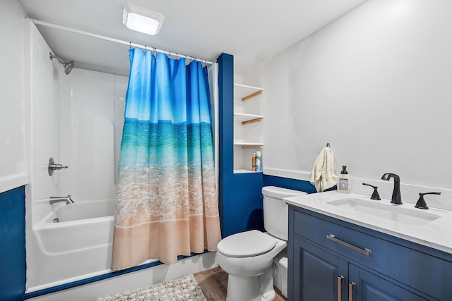 full bathroom featuring vanity, toilet, shower / bathtub combination with curtain, and hardwood / wood-style flooring