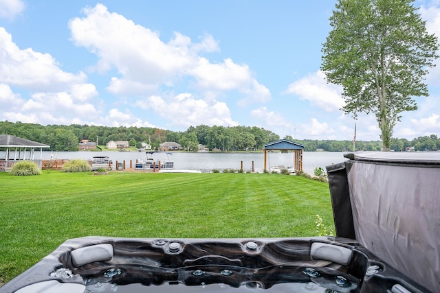 property view of water with a dock