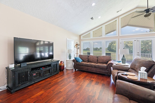 living room with french doors, a textured ceiling, dark hardwood / wood-style flooring, and ceiling fan