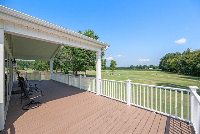 deck featuring a lawn