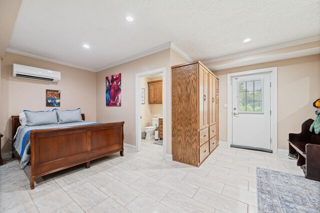 bedroom featuring ornamental molding, a wall mounted air conditioner, connected bathroom, and light tile patterned flooring