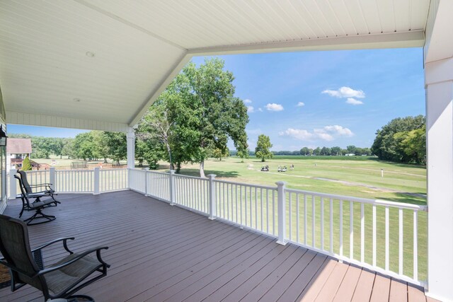 deck featuring a yard